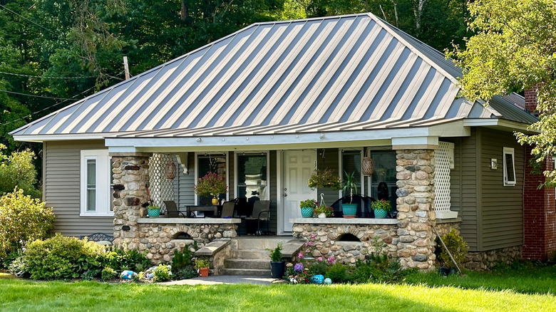 house with crowded stone porch