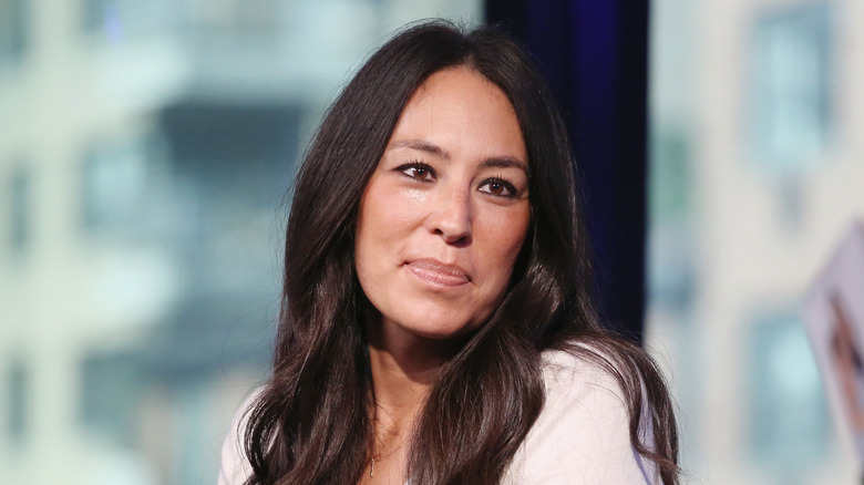 Joanna Gaines being interviewed at an event.