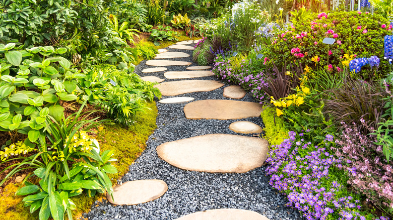 A lovely garden area next to a path