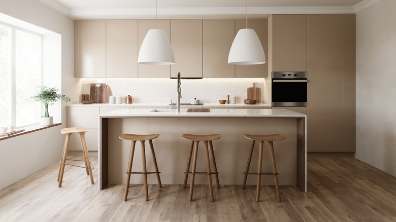 A beige kitchen with open layout