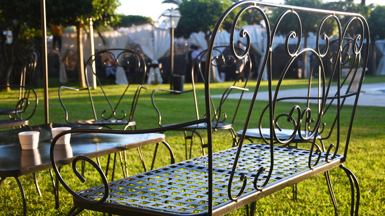 Black iron seating set in a yard