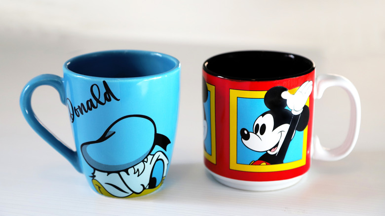 Disney mugs featuring Donald Duck and Mickey Mouse