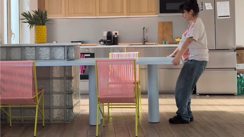 Micol Zanzuri's DIY glass block countertop project with pull-out dining table