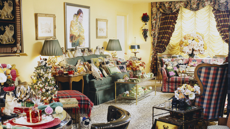 A cluttered living room with lots of mismatched DIY decor pieces