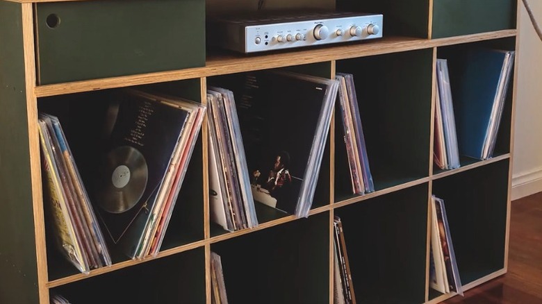 Vinyl records on a DIY plywood shelf