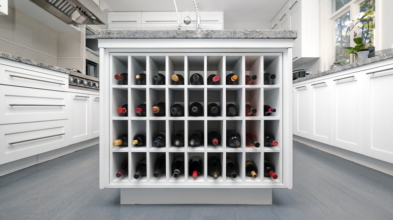 Modern kitchen with wine bottle storage built into the island