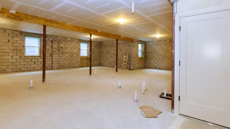 Unfinished basement with support poles