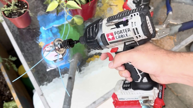 A DIY weed wacker made using an impact driver