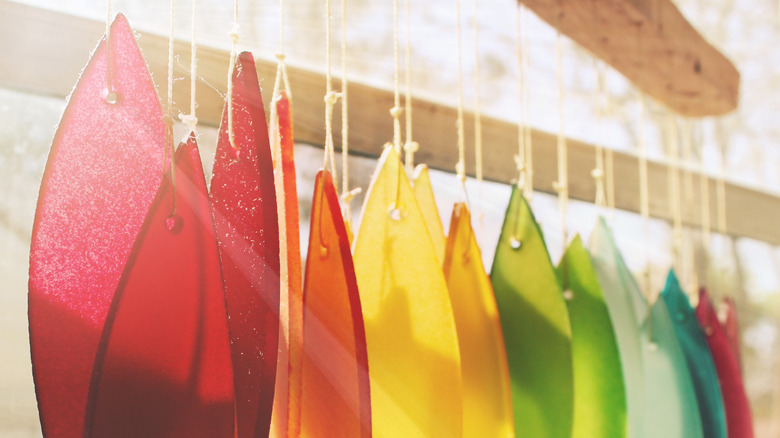 colorful suncatchers hanging on window
