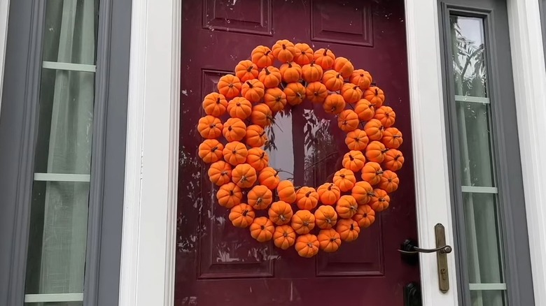 Putting the pumpkin wreath together