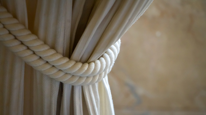 Drapes tied up with a rope