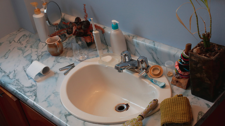Cluttered bathroom countertop