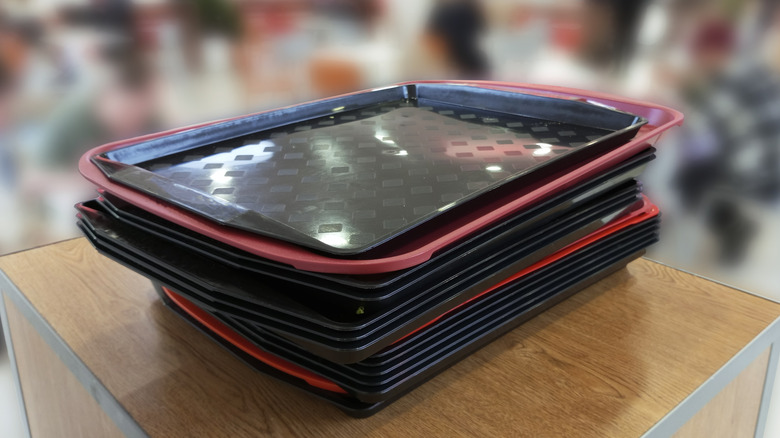 Stack of plastic serving trays