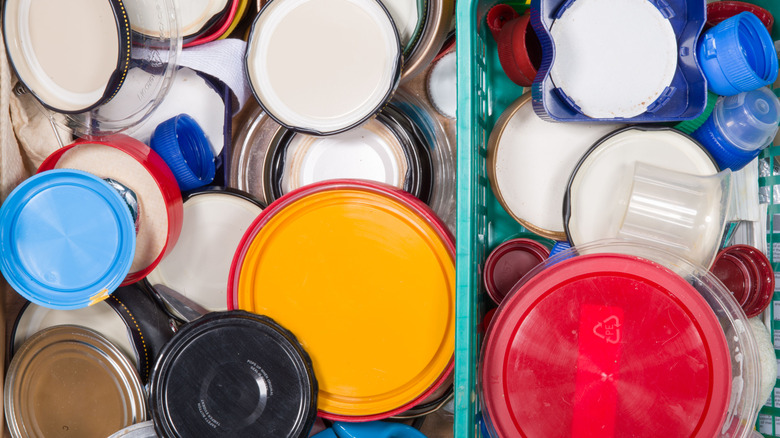 A messy selection of lids piled up