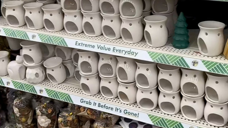The ceramic wax warmer on the shelves at a Dollar Tree.