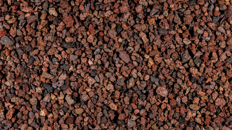 top-down view of red lava rock gravel