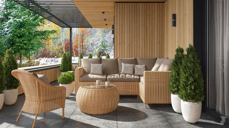 Wicker furniutre on a covered patio