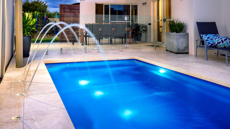 home pool with fountains