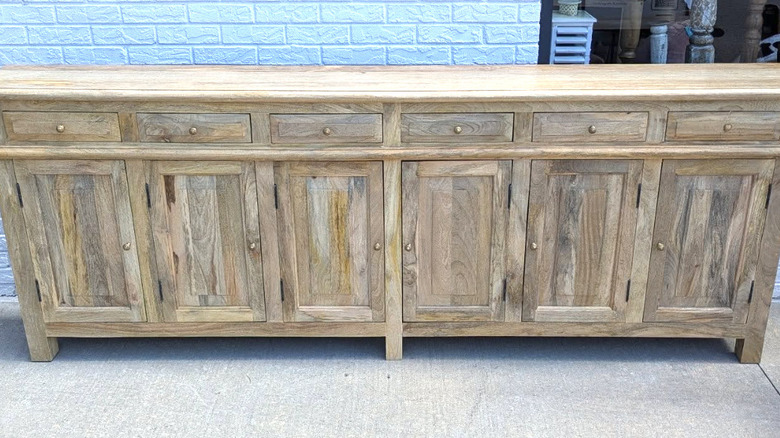 A range of custom kitchen cabinets made of mango wood