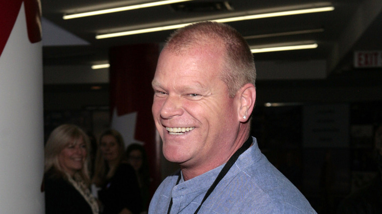 Mike Holmes smiling during a gathering