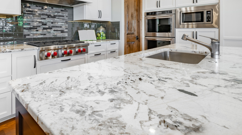 Sink in kitchen island installed in modern kitchen