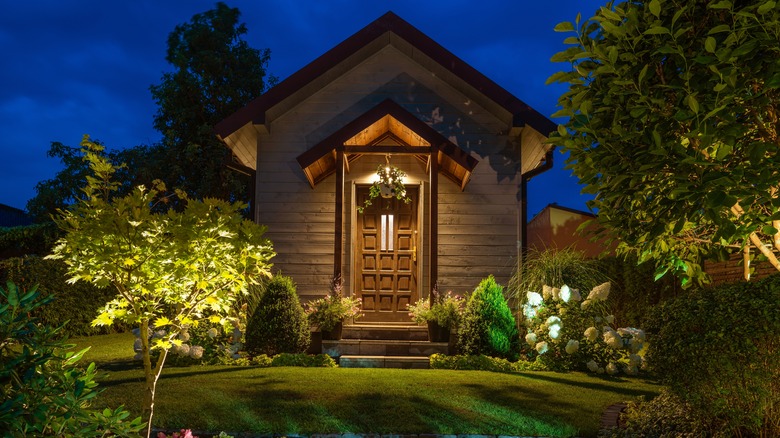 Garden shed lit-up at night