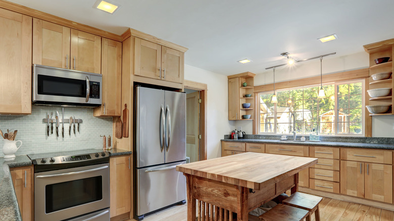 Kitchen with wood cabinets