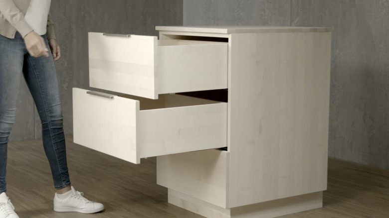Some BLUM undermount drawer slides are practically invisible installed under a drawer.