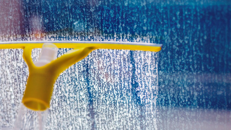 cleaning hard water stains on glass