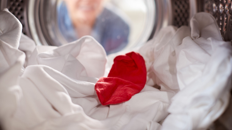 Red sock with white laundry