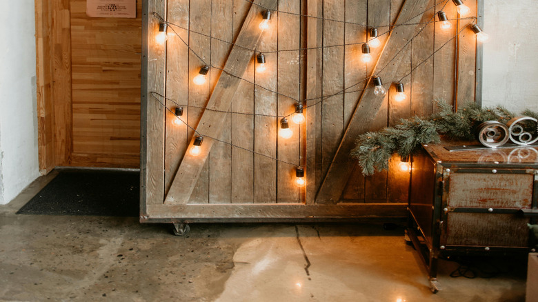 Rustic barn door on track with lights