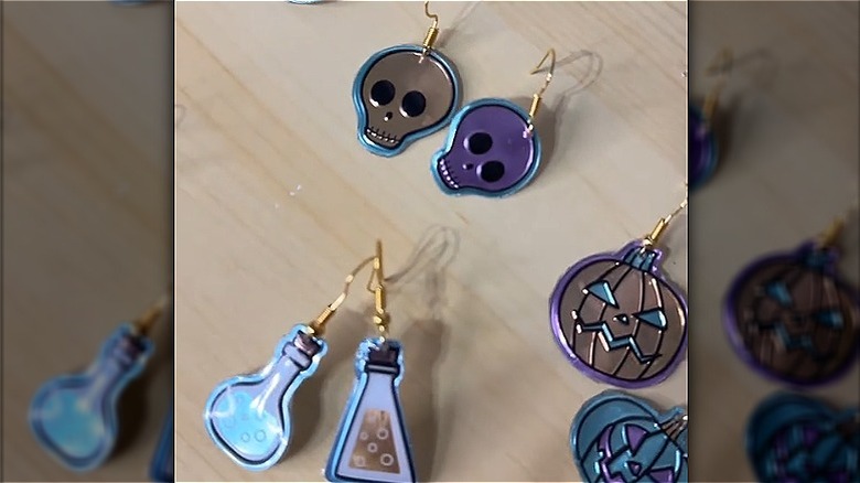 Sets of DIY Halloween earrings made using stickers