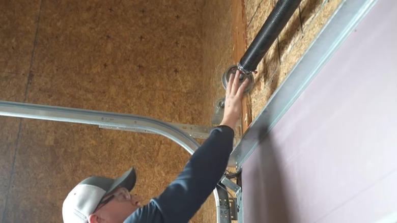 fixing garage door springs