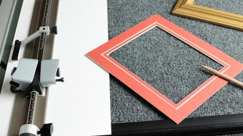 mat and frame on cutting surface with mat cutter