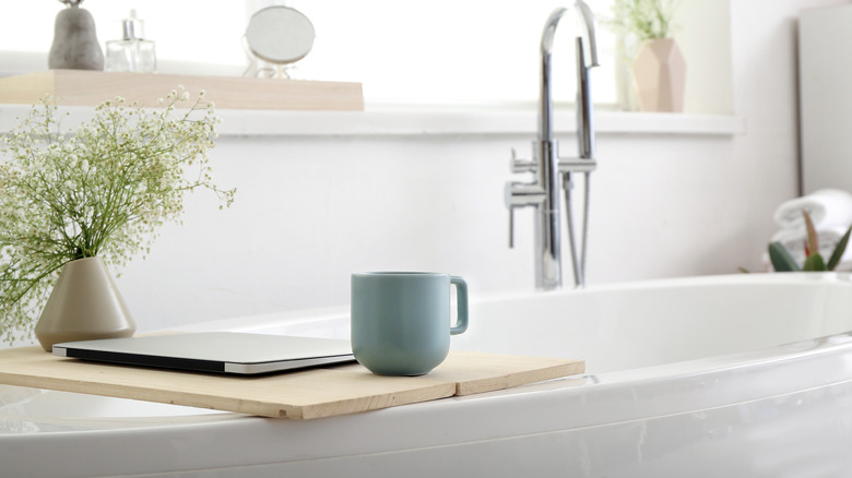 A coffee mug on bathtub