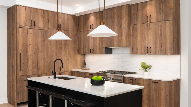 Modern kitchen interior with pendant lights.