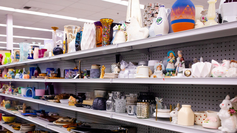 Thrift store aisle full of glass and crockery items