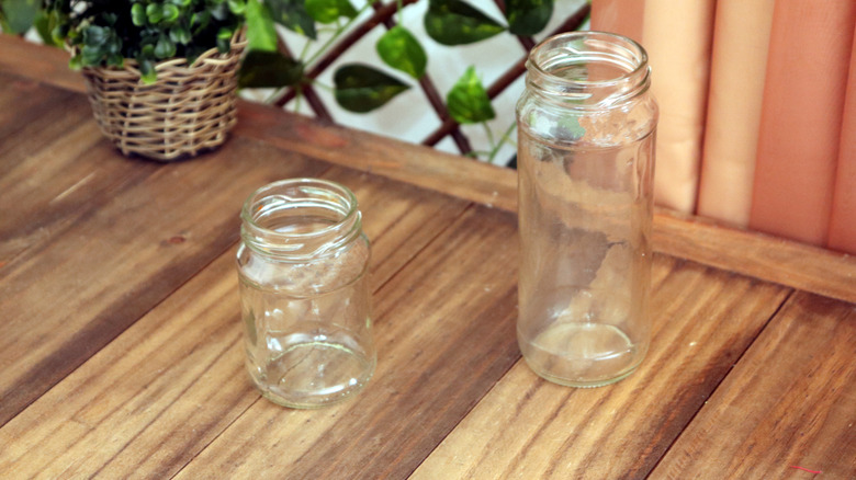 Empty glass jars on a countertop