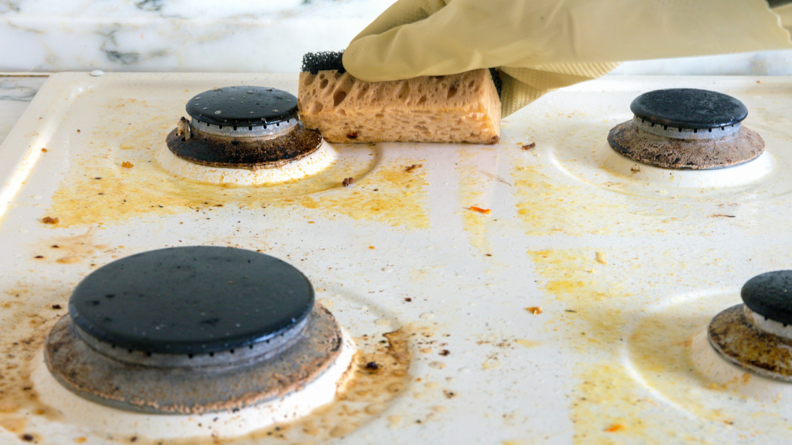 The Easy Plastic Wrap Hack That Will Leave Your Stovetop Sparkling