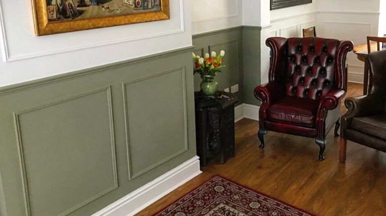 Sitting area with green wainscoting
