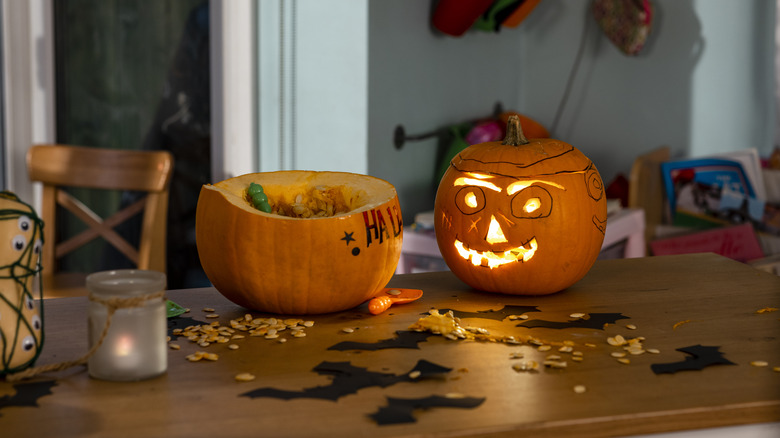pumpkins and bats on table