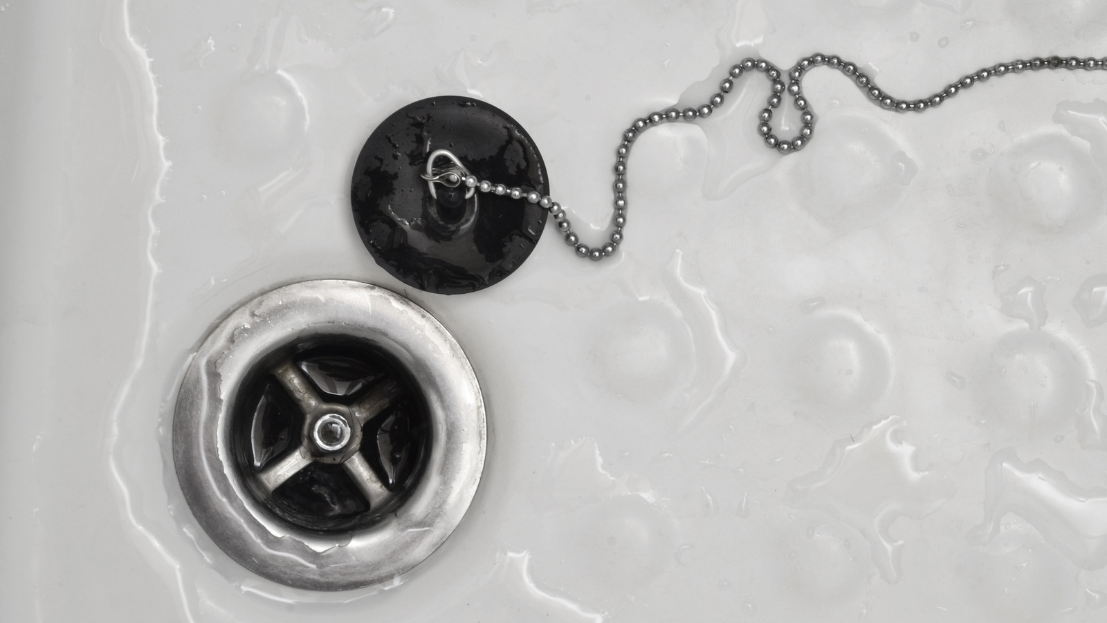 The Easy Zip Tie Hack That Will Help Clean Your Shower Drain