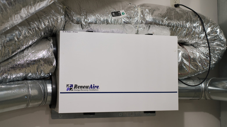 An energy recovery ventilator installed in a home