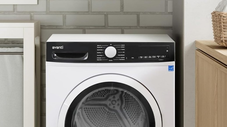 A laundry room with an Avanti clothes dryer that has a blue Energy Star sticker in the top right corner of the front panel.