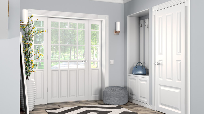 Modern entryway with closet.