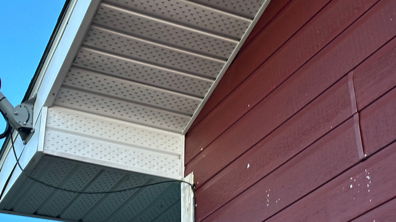 the view of soffit vents on a house from below