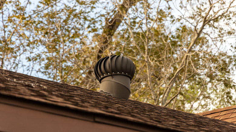 a whirly bird vent on a roof sometimes takes the place of a ridge vent