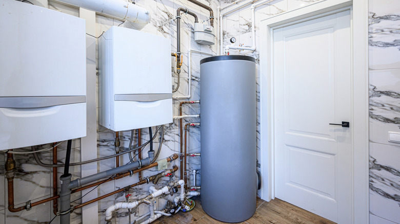 water heater in corner of utility room