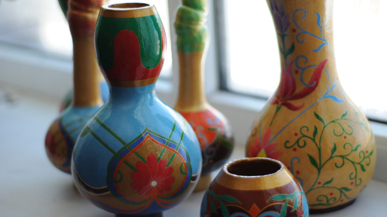Collection of painted gourd vases