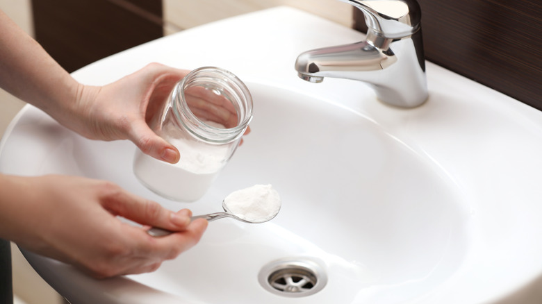 Baking soda added to sink